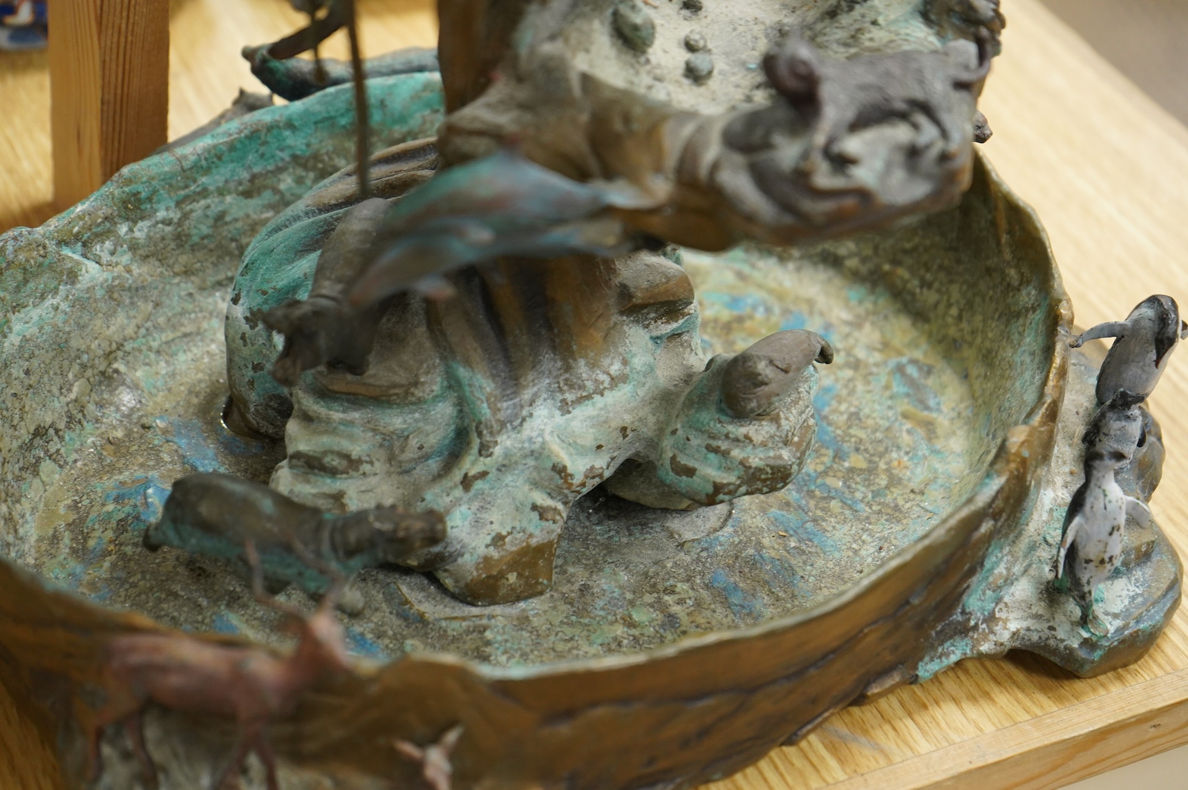 A Franklin Mint, decorative cast metal animal rockery, limited edition 1058/9500, 39cm high